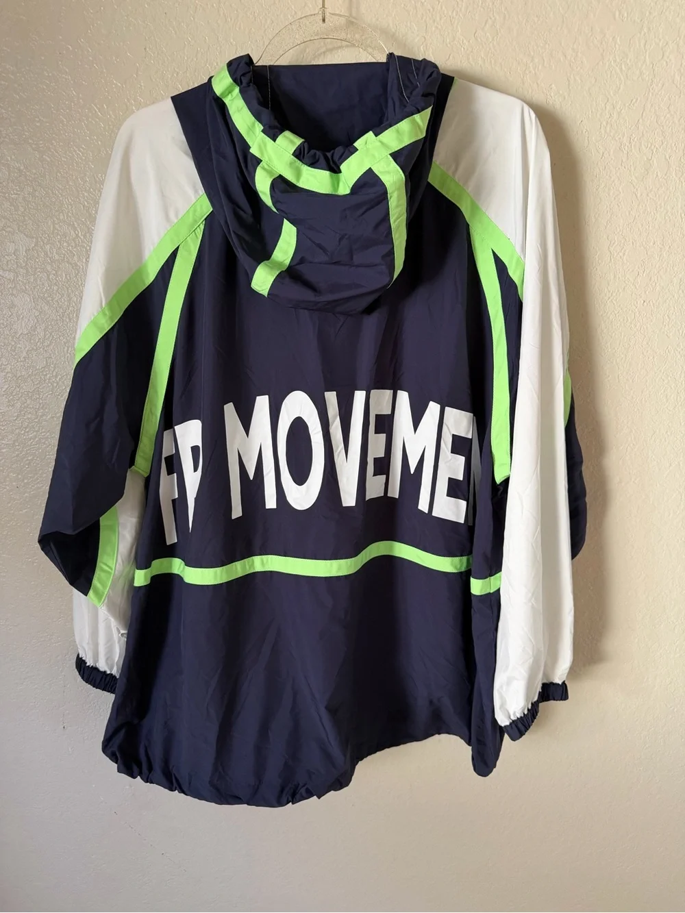 Free people FP movement like the wind logo jacket